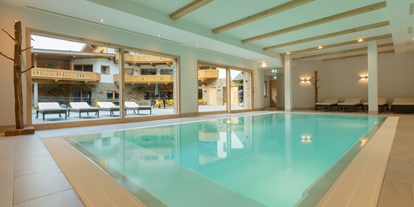 Hochzeit - Klimaanlage - Tirol - Wellnessbereich mit Innenpool, Fitnessraum und Saunabereich - das Chaletdorf - Pitztal