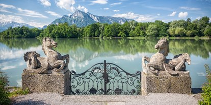 Hochzeit - Trauung im Freien - Salzburg-Umgebung - Seepferdchen mit Blick auf den Weiher - Hotel Schloss Leopoldskron