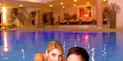 Hochzeit - Art der Location: Hotel - Scheffau am Wilden Kaiser - Schwimmbad mit Quellwasser - Feuriger Tatzlwurm