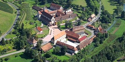 Hochzeit - Parkplatz: Busparkplatz - Bad Mergentheim - Das Klosterareal von oben. 6 Hektar für Ihre Traumhochzeit - Hotel Kloster & Schloss Bronnbach